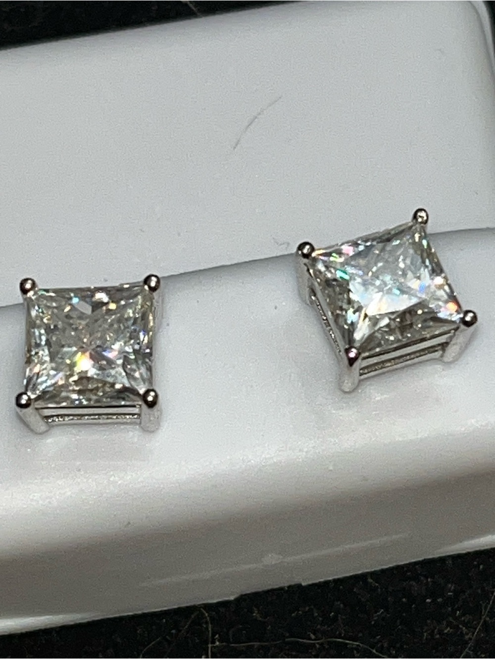 Beautiful sterling silver stud earrings with princess cut Mossanite